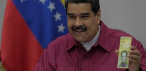 nicolas-maduro-apresenta-a-cedula-de-100-mil-bolivares-1510677926471_615x300-300x146 Maduro anuncia criação de criptomoeda venezuelana para enfrentar bloqueio dos EUA.